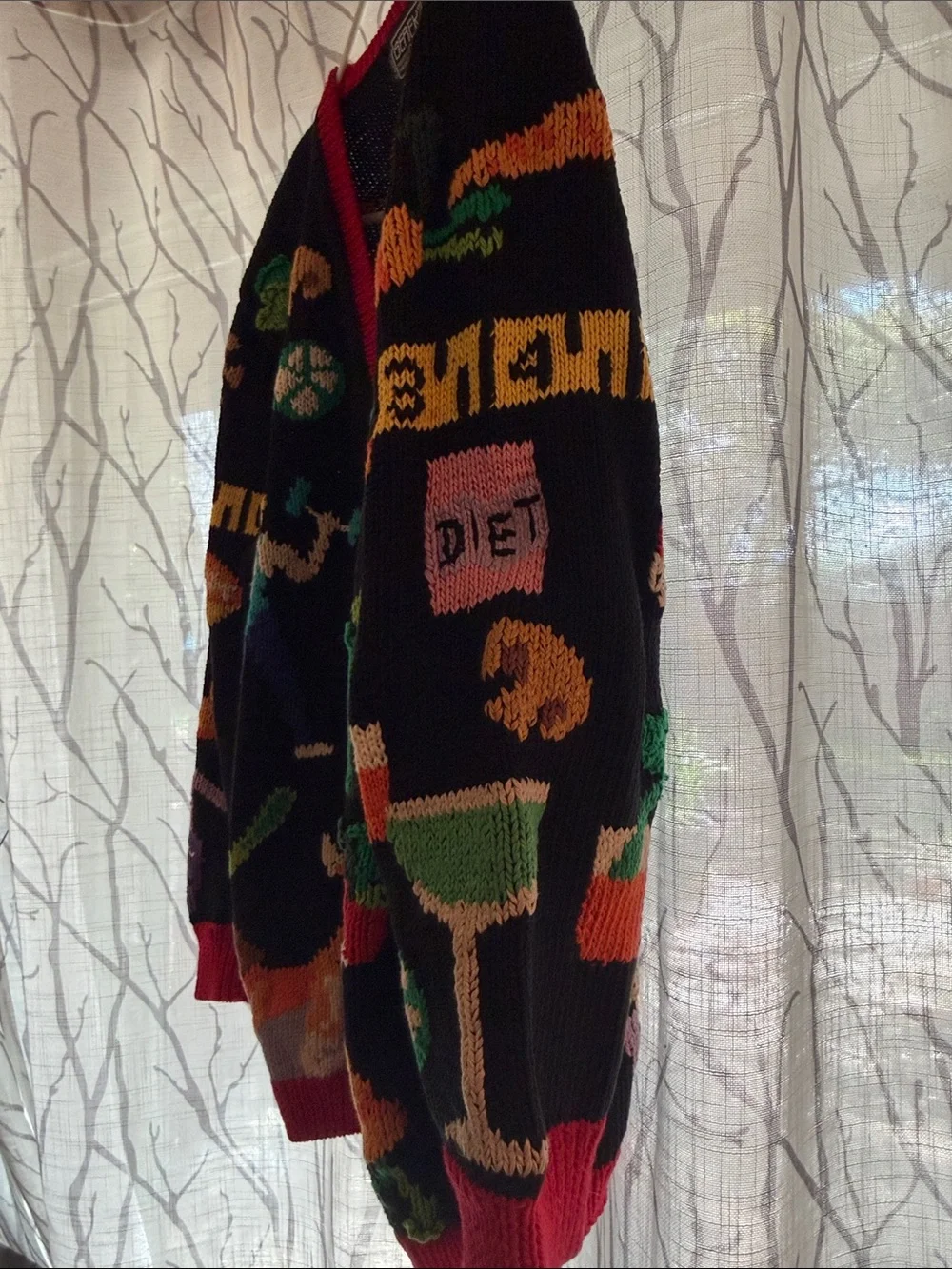 Vintage Berek Black Knit Cardigan Sweater with Bold Multicolor Athletic Motifs